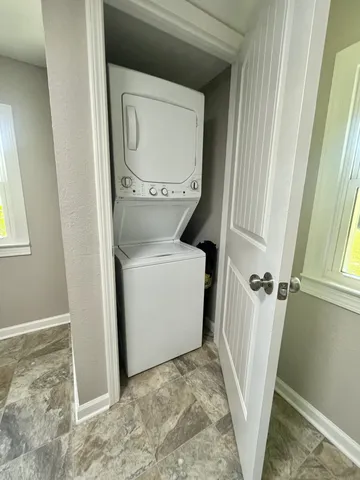 a view of bathroom with a sink and toilet