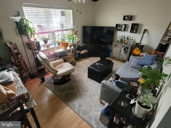 a room with furniture and a flat screen tv