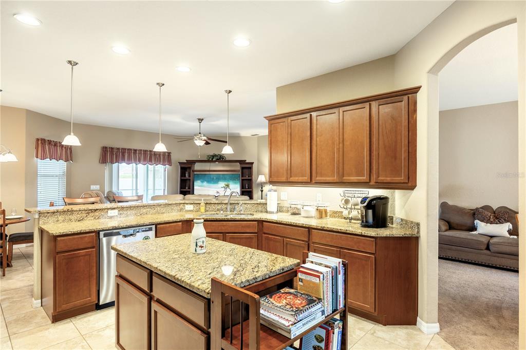 2836 Whitney Street Lakeland, FL 33813 - Photo 12 of 44 a kitchen with a sink a counter top space and appliances