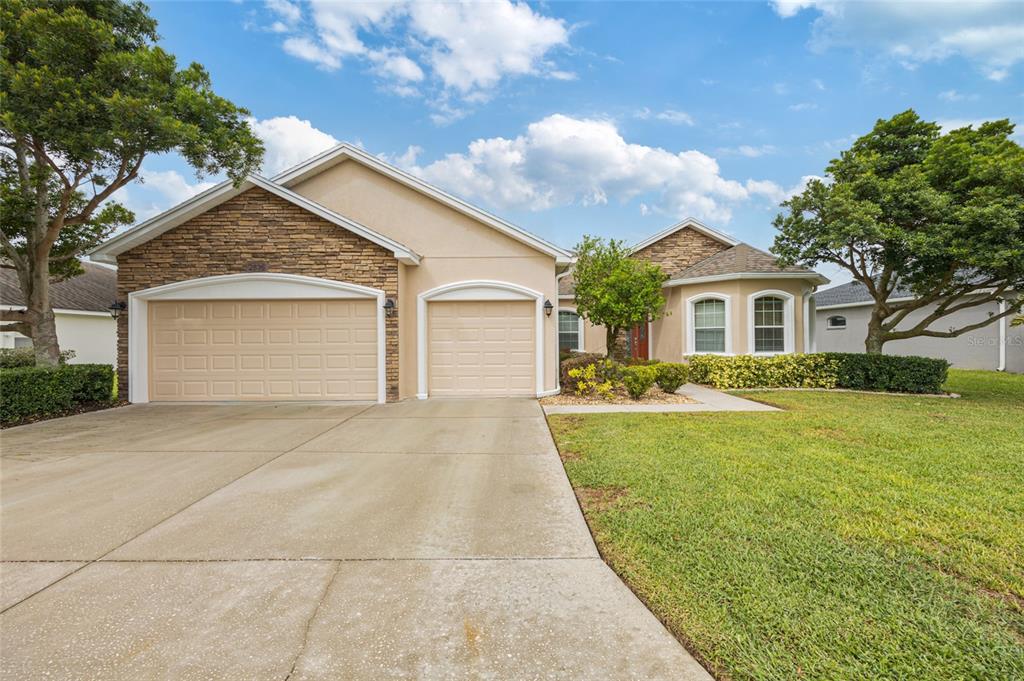 2836 Whitney Street Lakeland, FL 33813 - Photo 2 of 44 a front view of a house with yard