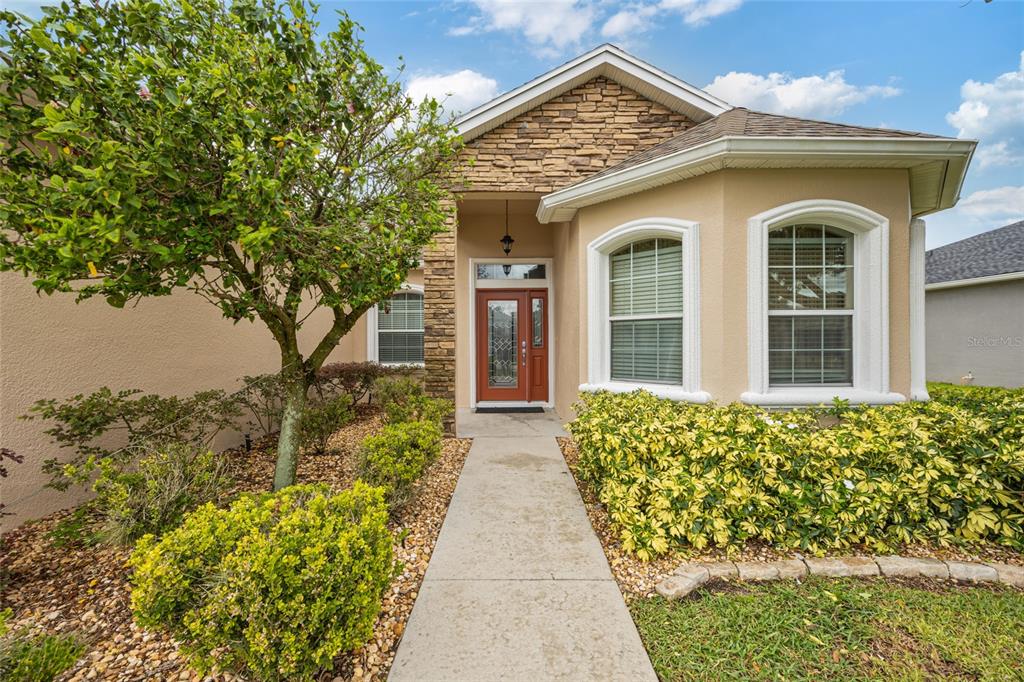 2836 Whitney Street Lakeland, FL 33813 - Photo 3 of 44 front view of a house with a small yard