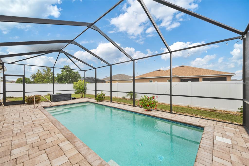2836 Whitney Street Lakeland, FL 33813 - Photo 33 of 44 a view of a swimming pool with a porch