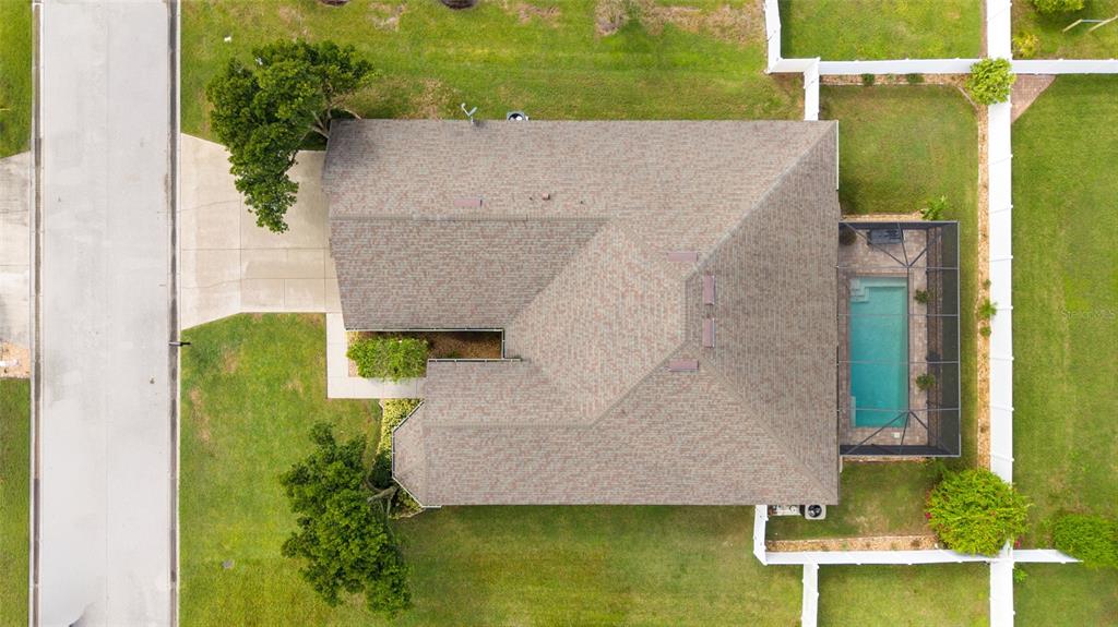 2836 Whitney Street Lakeland, FL 33813 - Photo 37 of 44 an aerial view of a house with swimming pool