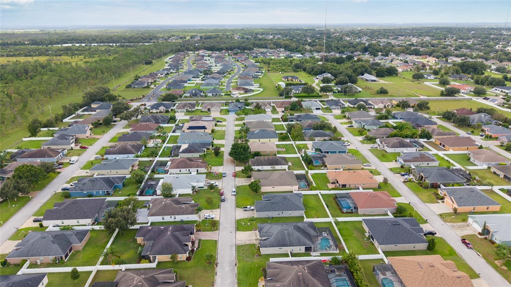 2836 Whitney Street Lakeland, FL 33813 - Photo 41 of 44 an aerial view of residential houses with outdoor space and river