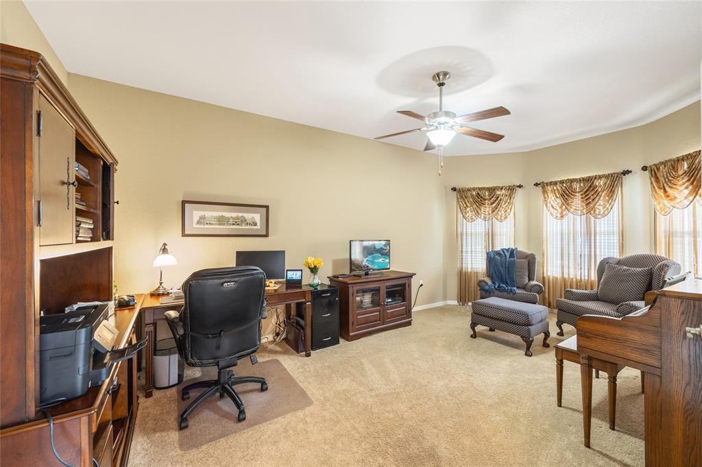 2836 Whitney Street Lakeland, FL 33813 - Photo 8 of 44 a view of a livingroom with workspace and a window