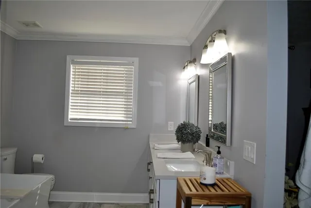 a view of balcony with furniture and wooden deck