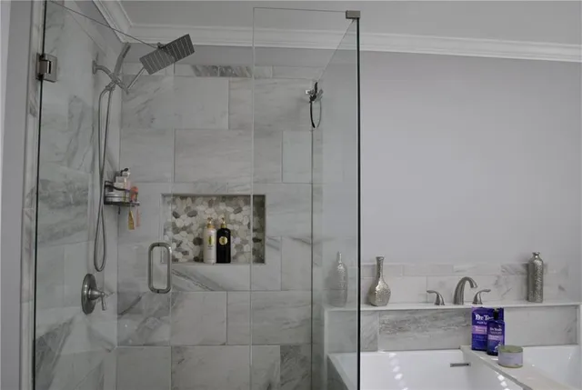 a view of balcony with deck wooden floor and outdoor seating