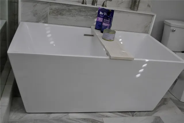 a view of a backyard with swimming pool