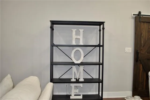 a kitchen with stainless steel appliances a refrigerator and cabinets