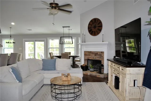 a dining room with furniture and window