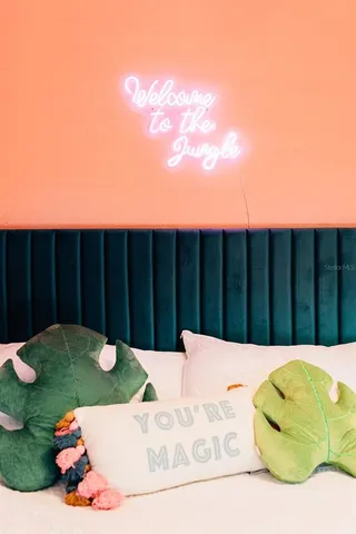 a view of a swimming pool with a patio