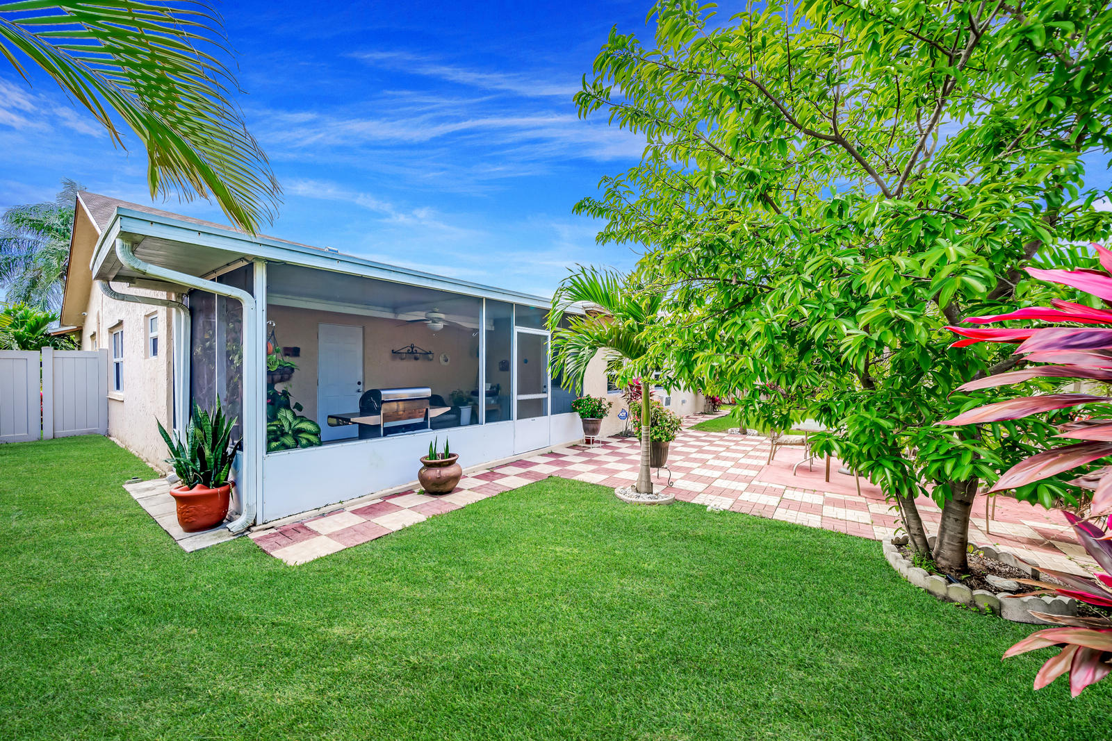 8895 Southwest 18th Road Boca Raton, FL 33433 - Photo 12 of 60 Backyard/screened/covered patio
