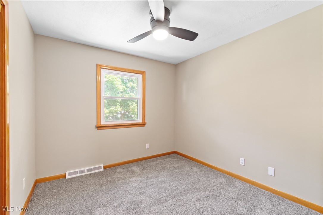 1716 Betz Road Akron, OH 44306 - Photo 17 of 28 Spare room with carpet and ceiling fan