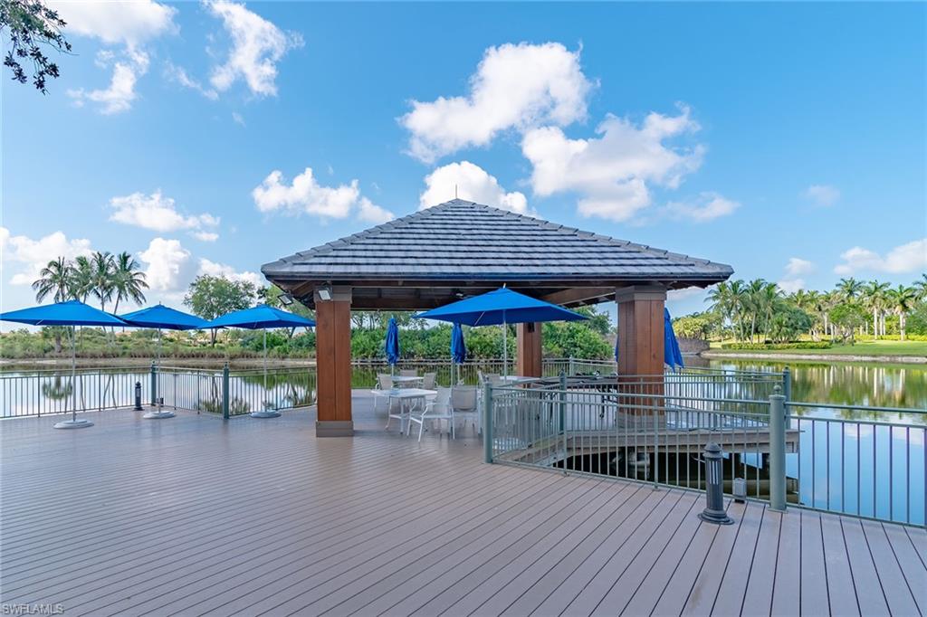 8345 Whisper Trace Way, Unit 102 Naples, FL 34114 - Photo 25 of 25 a view of house with swimming pool outdoor seating