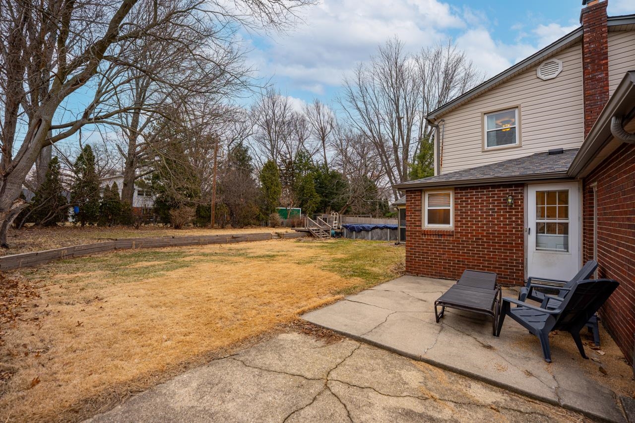 4966 Brigadoon Road Rockford, IL 61107 - Photo 36 of 40 a view of a house with backyard and sitting area