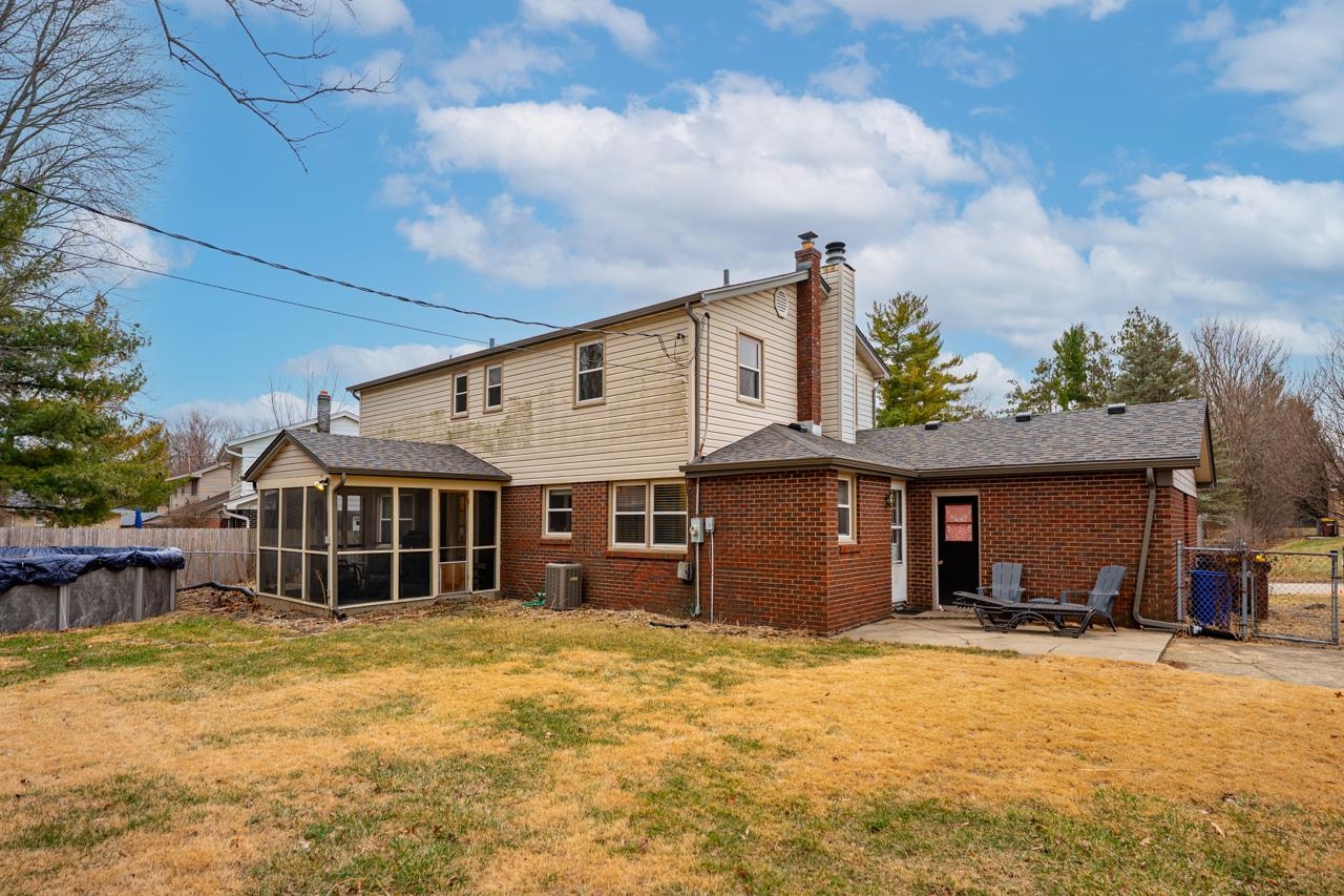 4966 Brigadoon Road Rockford, IL 61107 - Photo 37 of 40 a front view of a house with a yard