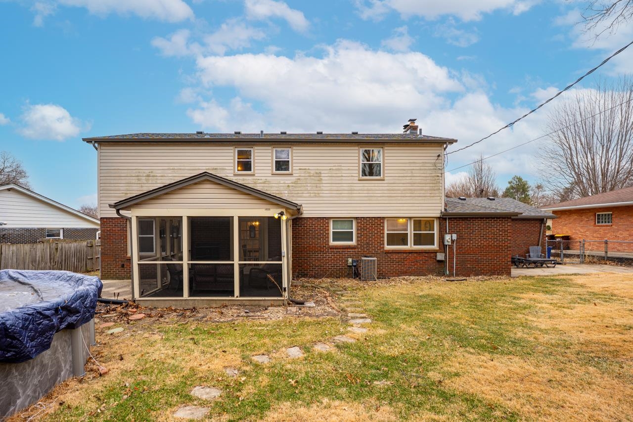 4966 Brigadoon Road Rockford, IL 61107 - Photo 39 of 40 a large house with a large space in front of it