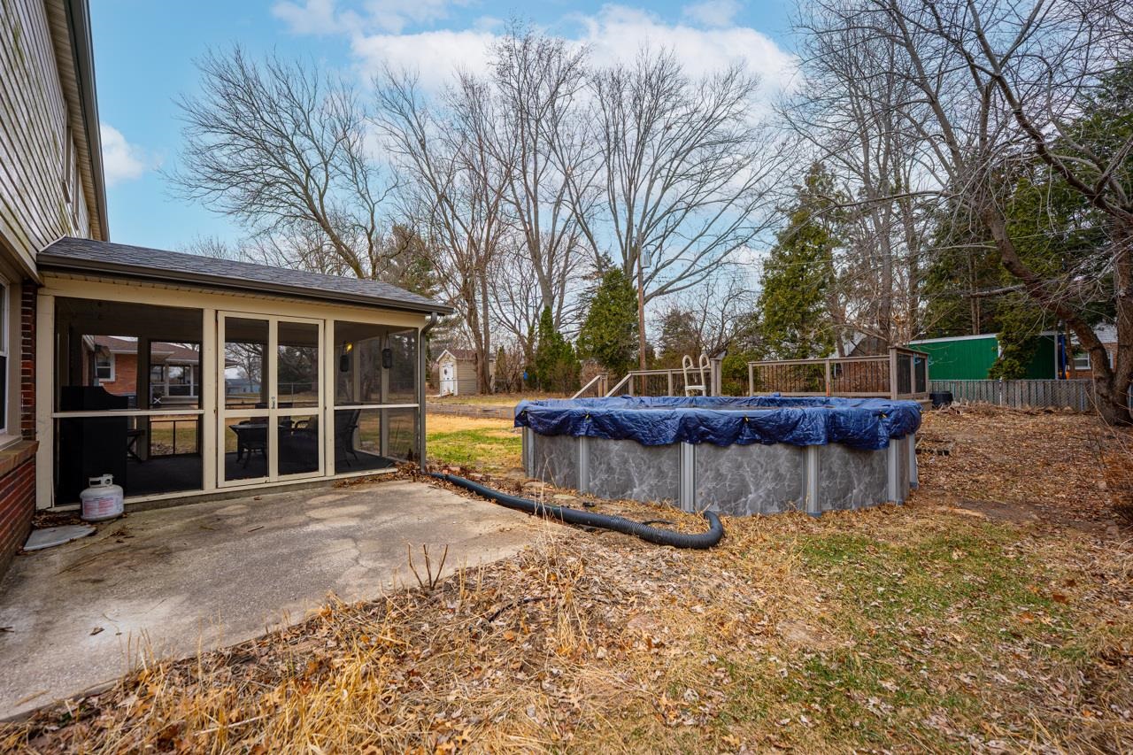 4966 Brigadoon Road Rockford, IL 61107 - Photo 40 of 40 a view of a house with a yard