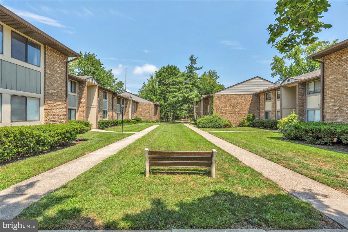 115 East Kings Highway, Unit 334 Maple Shade, NJ 08052 - Photo 14 of 26 a view of a house with a yard