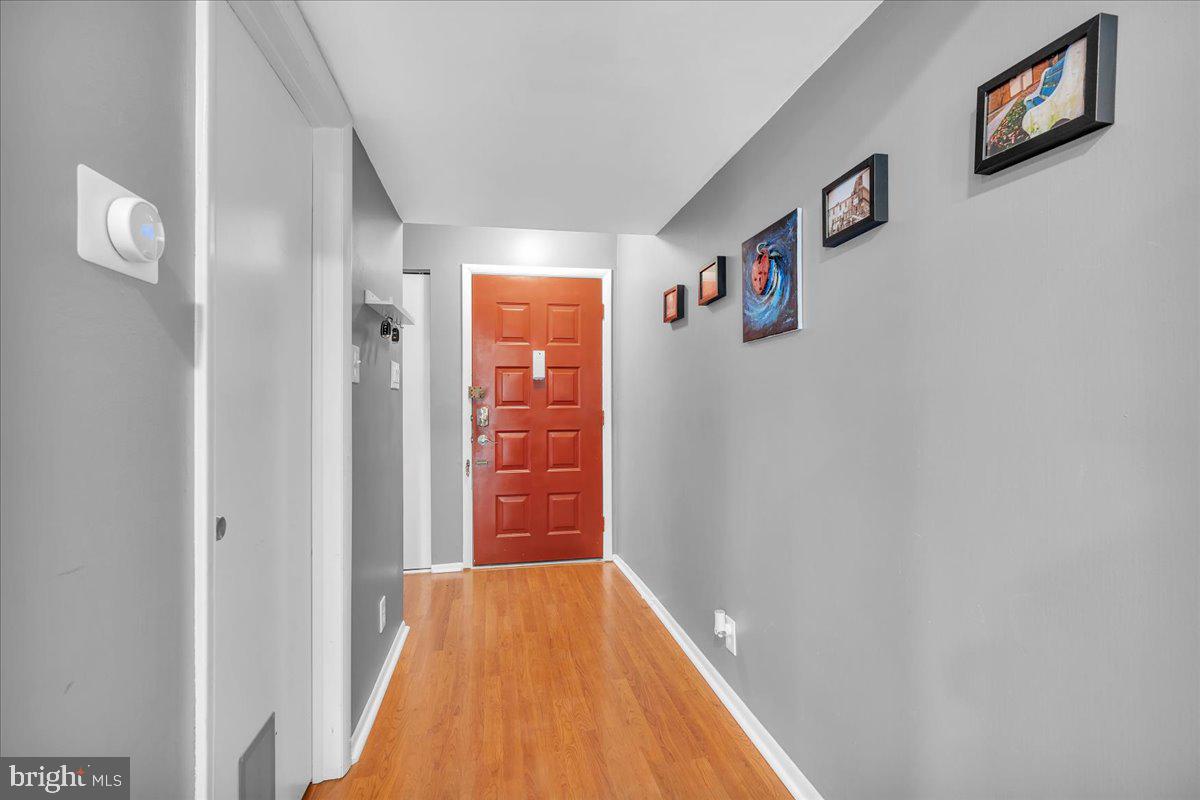 115 East Kings Highway, Unit 334 Maple Shade, NJ 08052 - Photo 17 of 26 a view of a hallway with wooden floor
