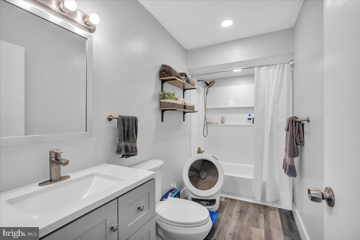 115 East Kings Highway, Unit 334 Maple Shade, NJ 08052 - Photo 23 of 26 a bathroom with a sink toilet and shower