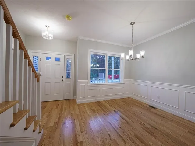 a view of livingroom with hardwood floor and ceiling fan