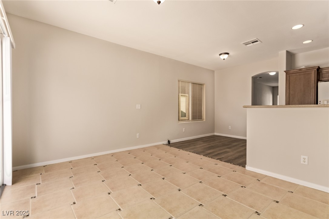 6224 Boulder Rise Street Las Vegas, NV 89115 - Photo 10 of 26 Unfurnished living room with recessed lighting and baseboards