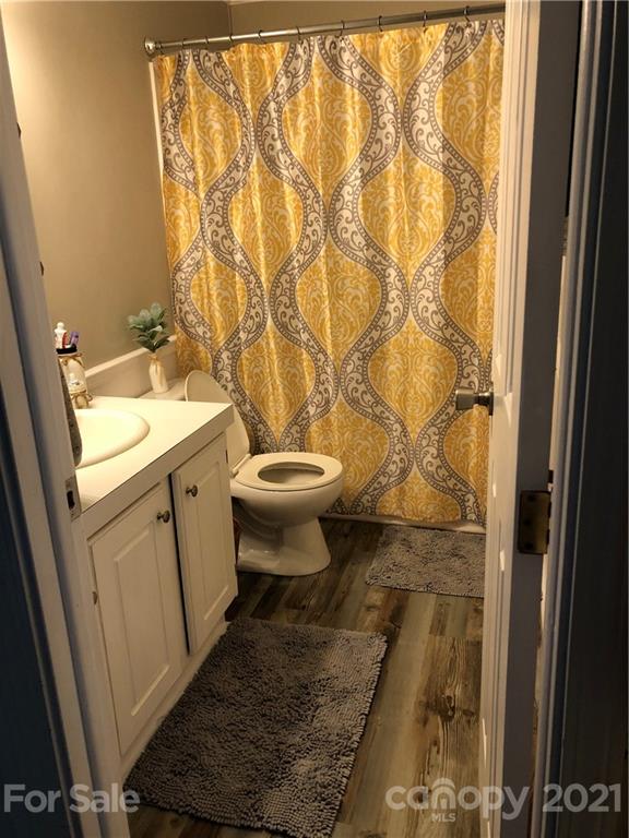 3485 Organ Church Road Rockwell, NC 28138 - Photo 17 of 33 a bathroom with a sink toilet and shower