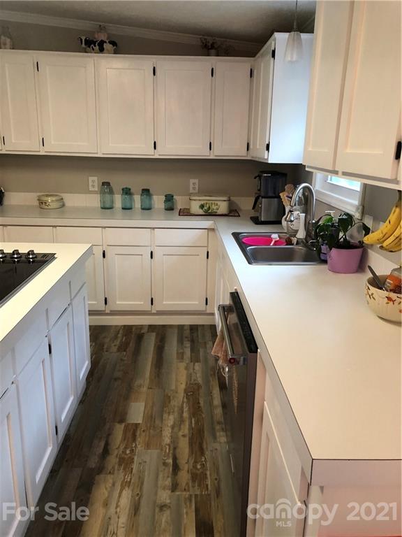 3485 Organ Church Road Rockwell, NC 28138 - Photo 5 of 33 a kitchen with a sink and cabinets