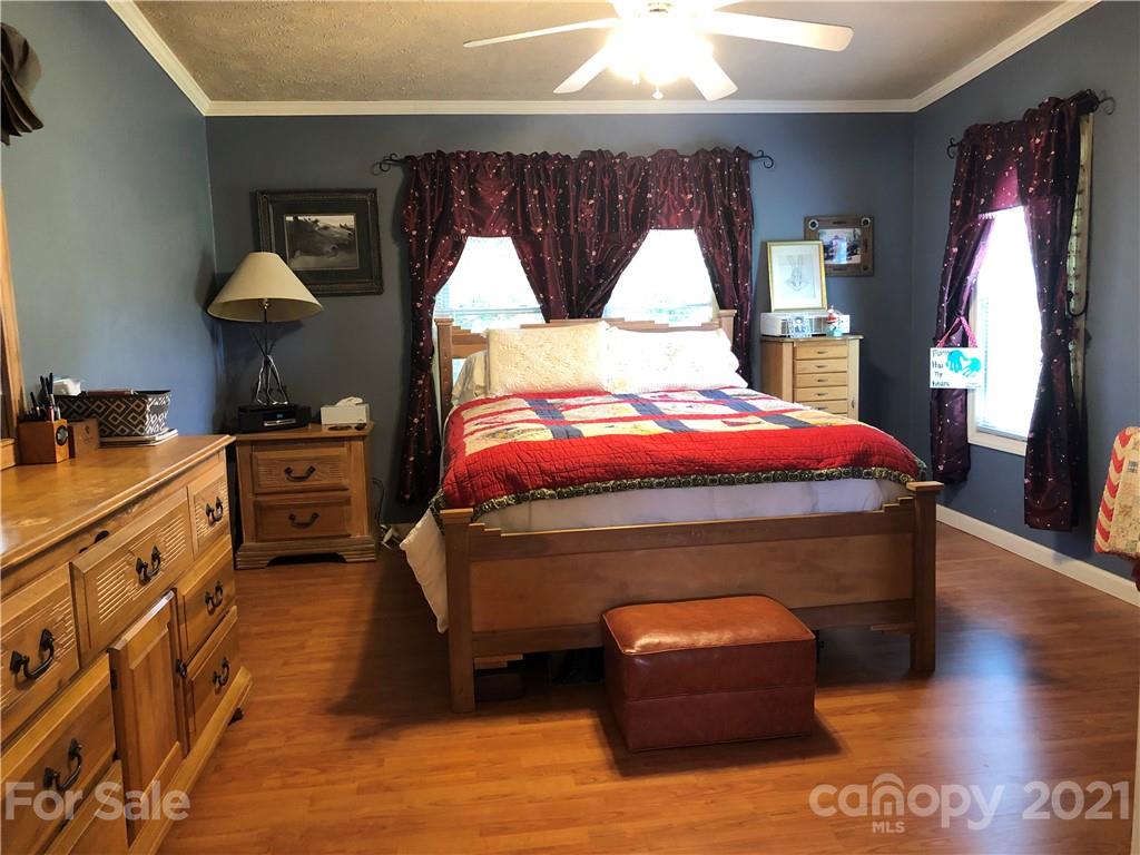 3485 Organ Church Road Rockwell, NC 28138 - Photo 10 of 33 a bedroom with a bed and a window