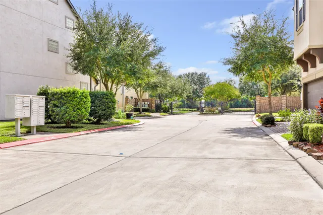 a view of a building with trees