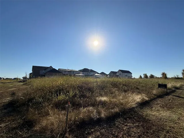 a view of a house with a mountain and a forest