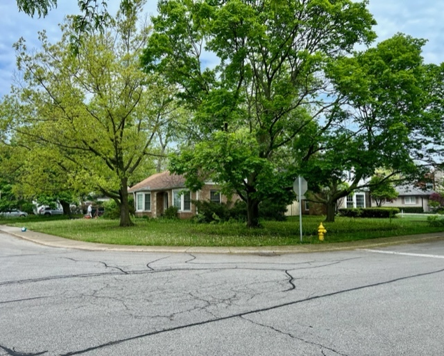 1146 Raleigh Road Glenview, IL 60025 - Photo 1 of 3 a front view of a house with a yard