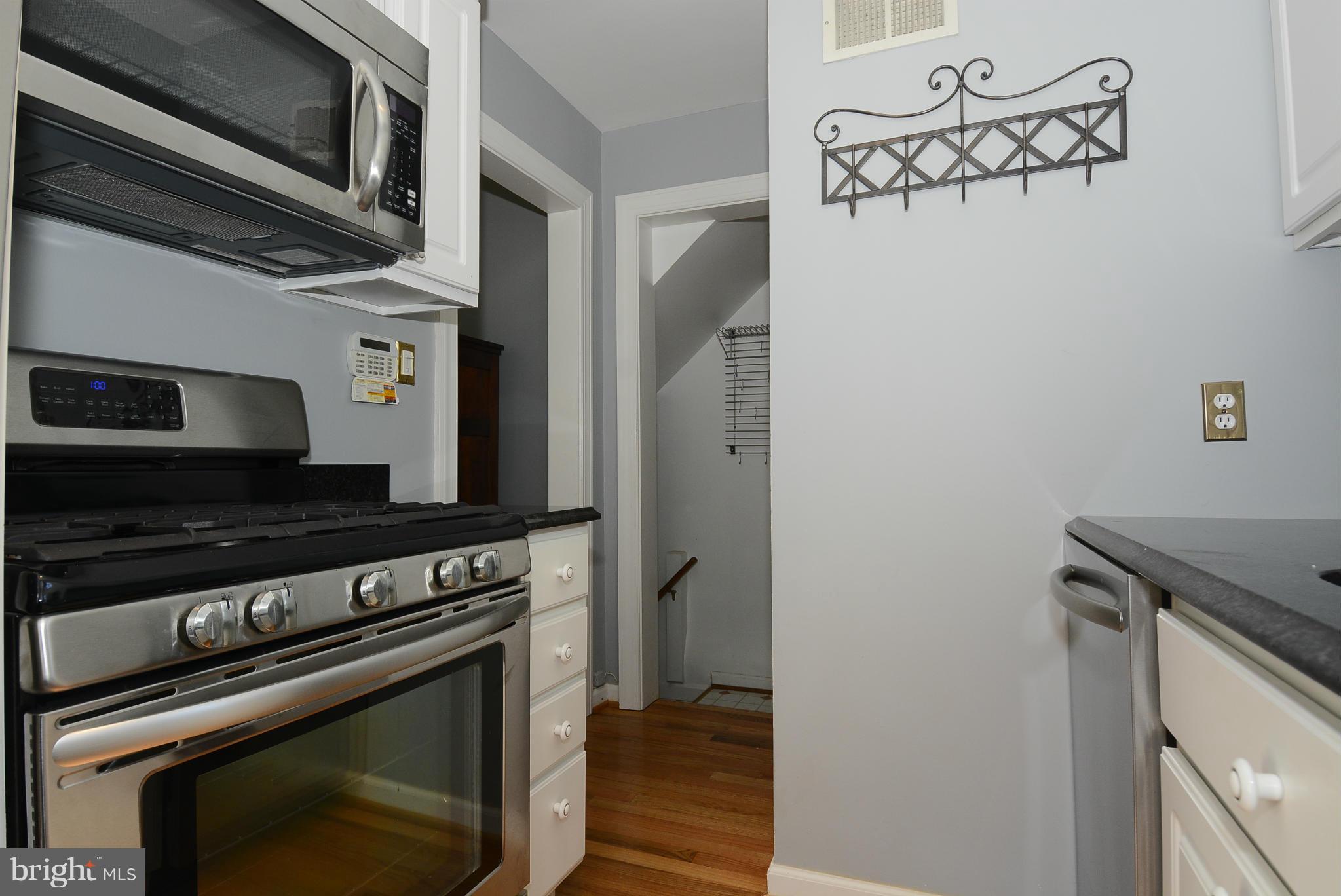 9617 Brunett Avenue Silver Spring, MD 20901 - Photo 12 of 28 Five burner stainless steel gas stove
