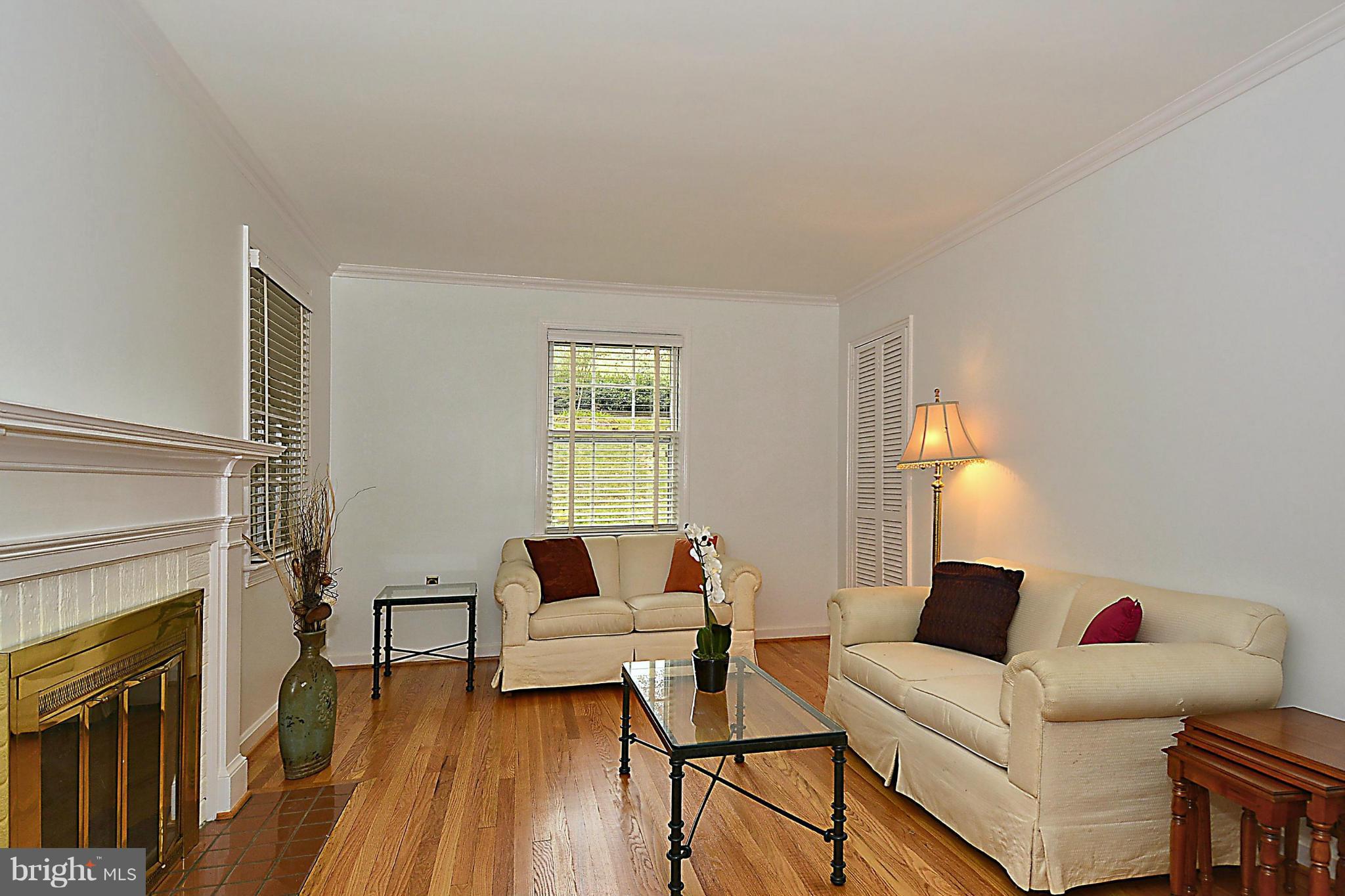 9617 Brunett Avenue Silver Spring, MD 20901 - Photo 5 of 28 Living Room with Gleaming Wood Floors