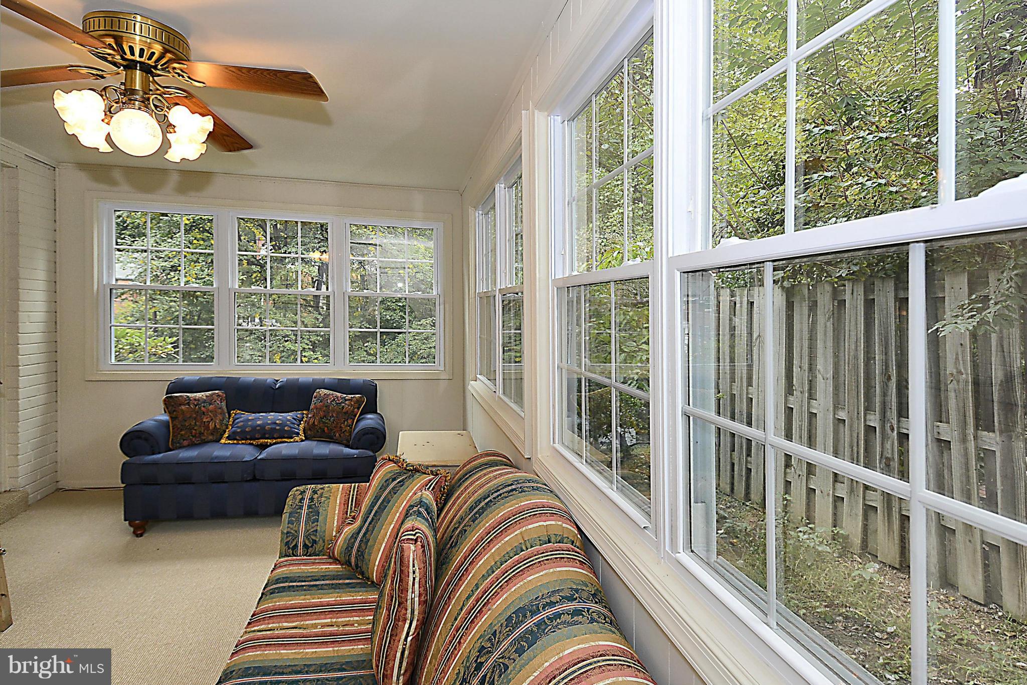 9617 Brunett Avenue Silver Spring, MD 20901 - Photo 7 of 28 Sunrom with walls of Windows