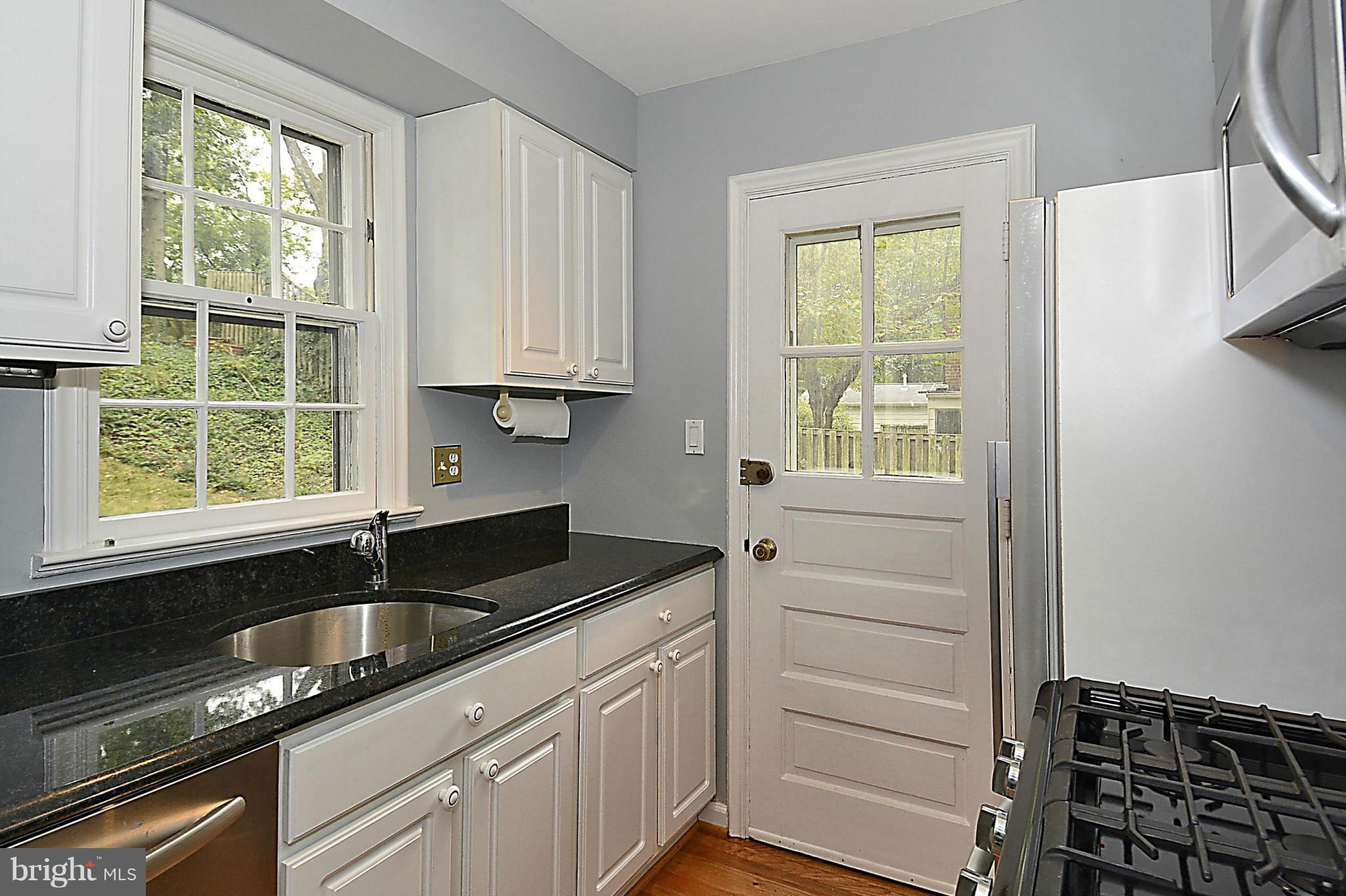 9617 Brunett Avenue Silver Spring, MD 20901 - Photo 10 of 28 Granite and Stainless Steel Kitchen