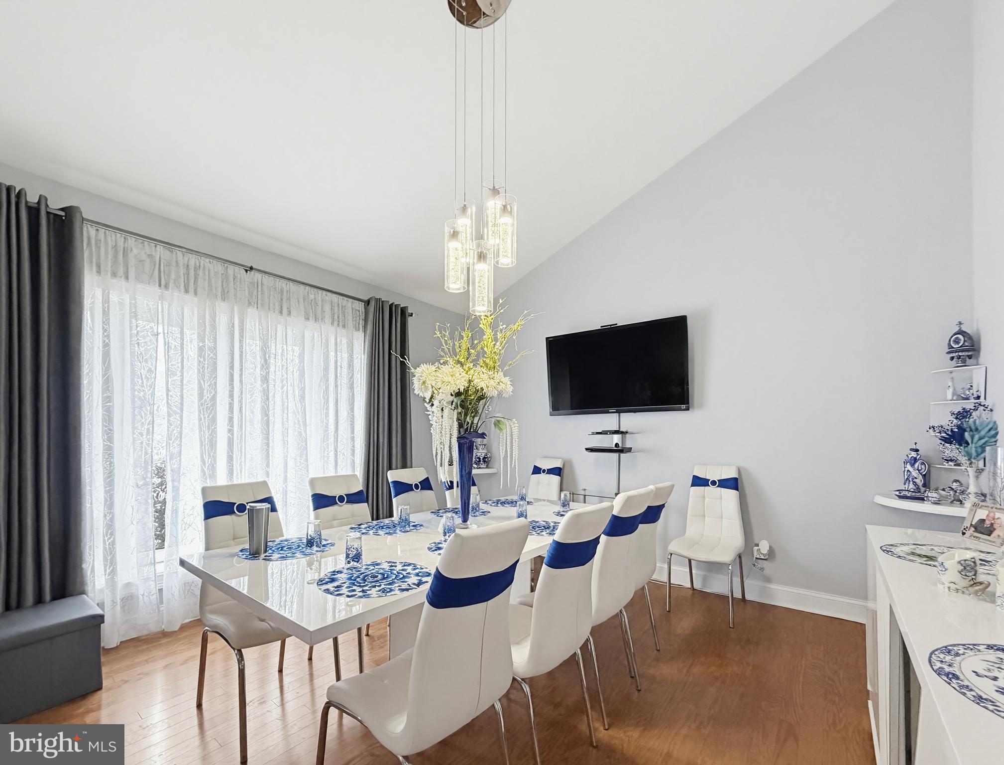 254 Allen Lane Warminster, PA 18974 - Photo 12 of 85 a view of a dining room with furniture and a chandelier