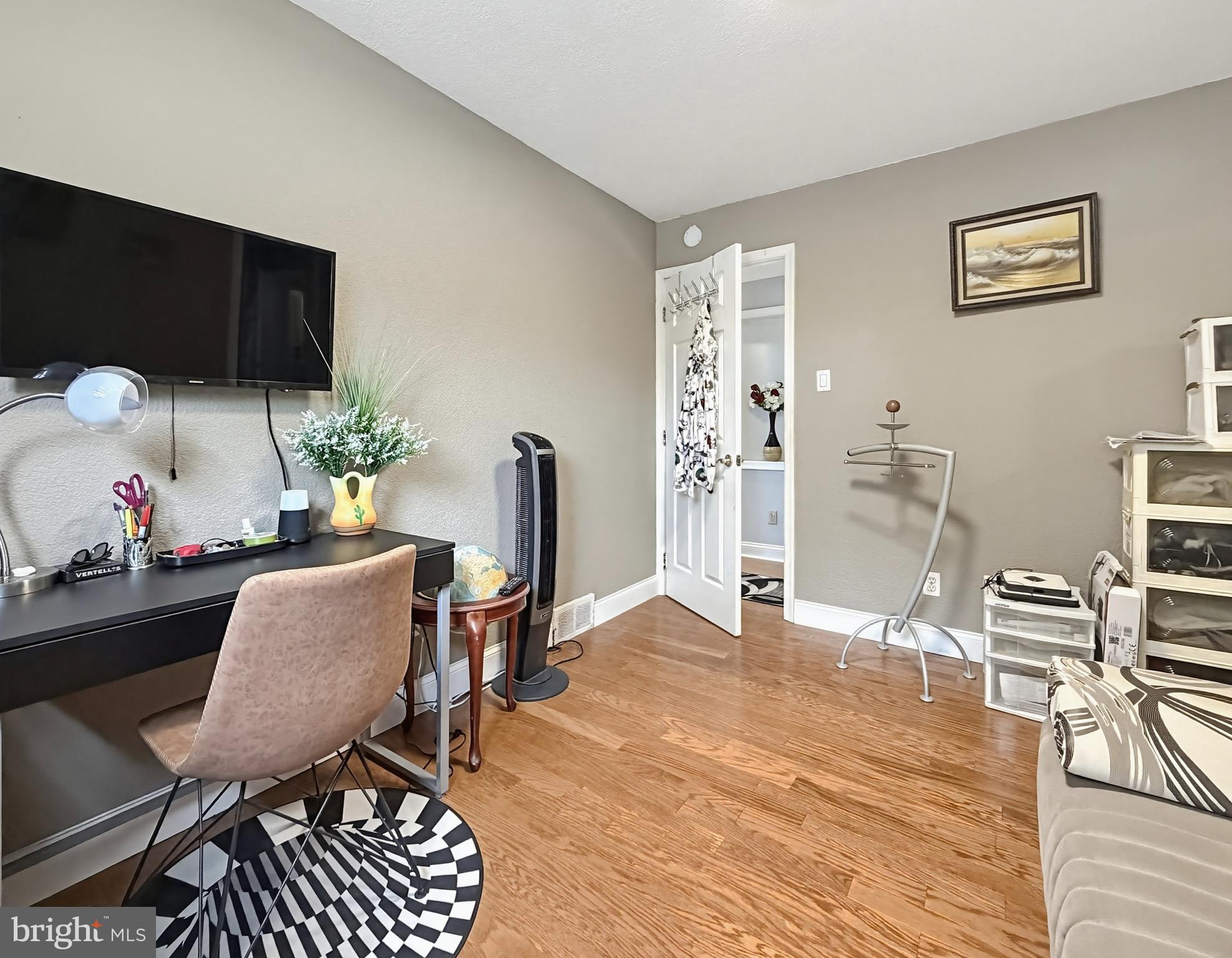 254 Allen Lane Warminster, PA 18974 - Photo 31 of 85 a workspace with furniture and a flat screen tv