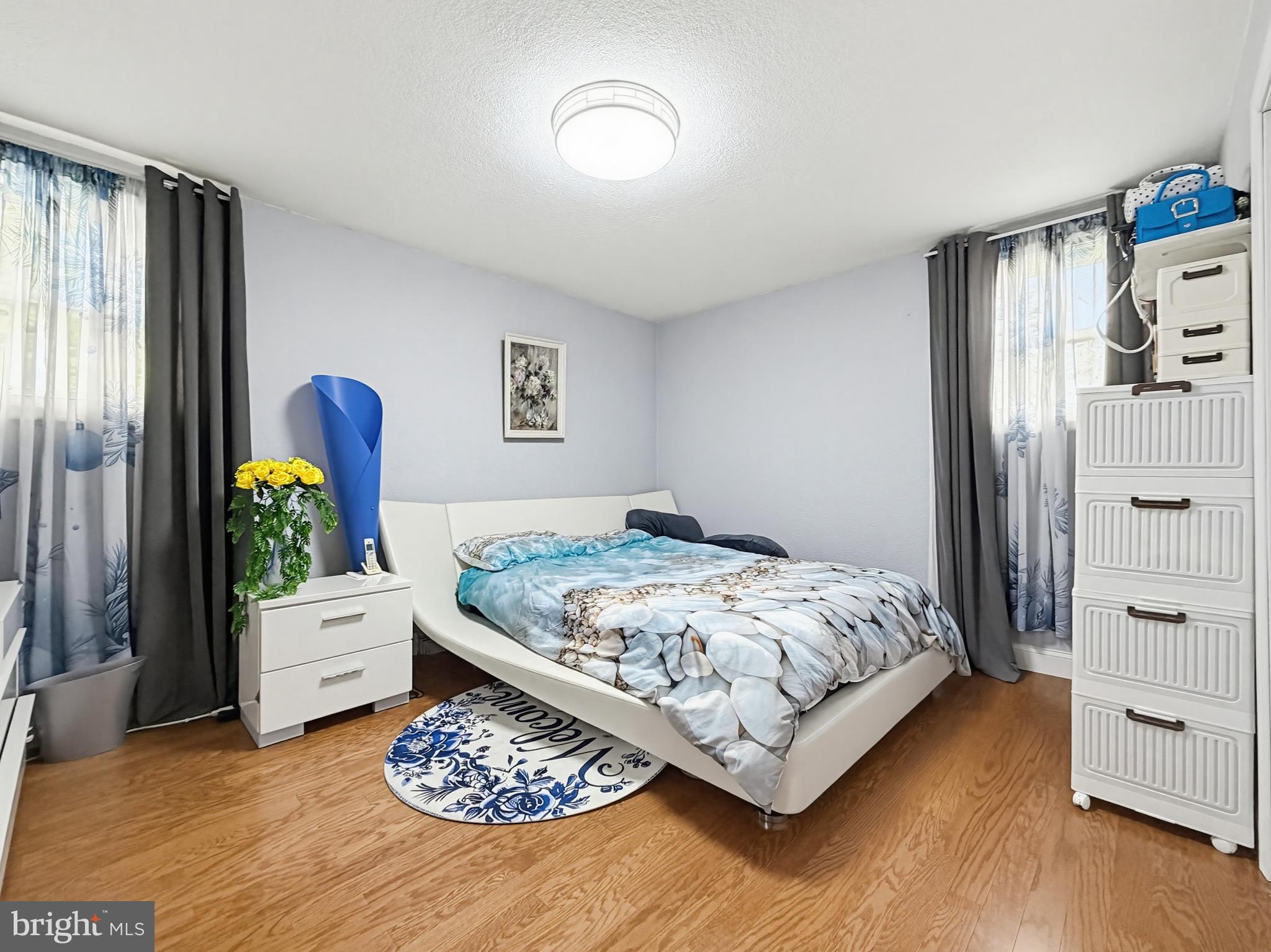 254 Allen Lane Warminster, PA 18974 - Photo 33 of 85 a bedroom with a bed table and a window