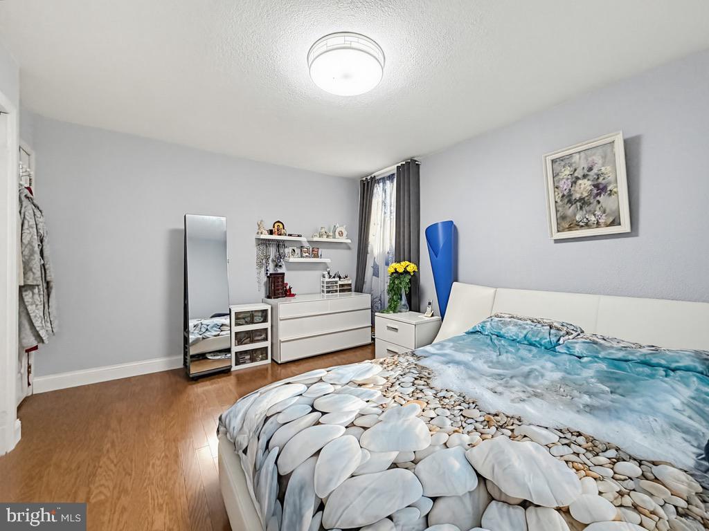 254 Allen Lane Warminster, PA 18974 - Photo 36 of 85 a bedroom with a bed and a table in it