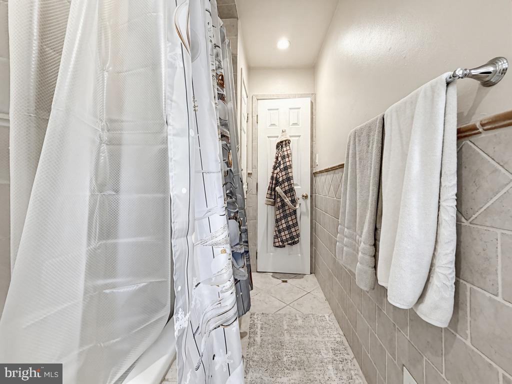 254 Allen Lane Warminster, PA 18974 - Photo 39 of 85 a bathroom with a shower and a glass door