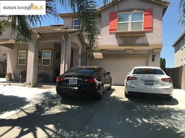 a car parked in front of a house
