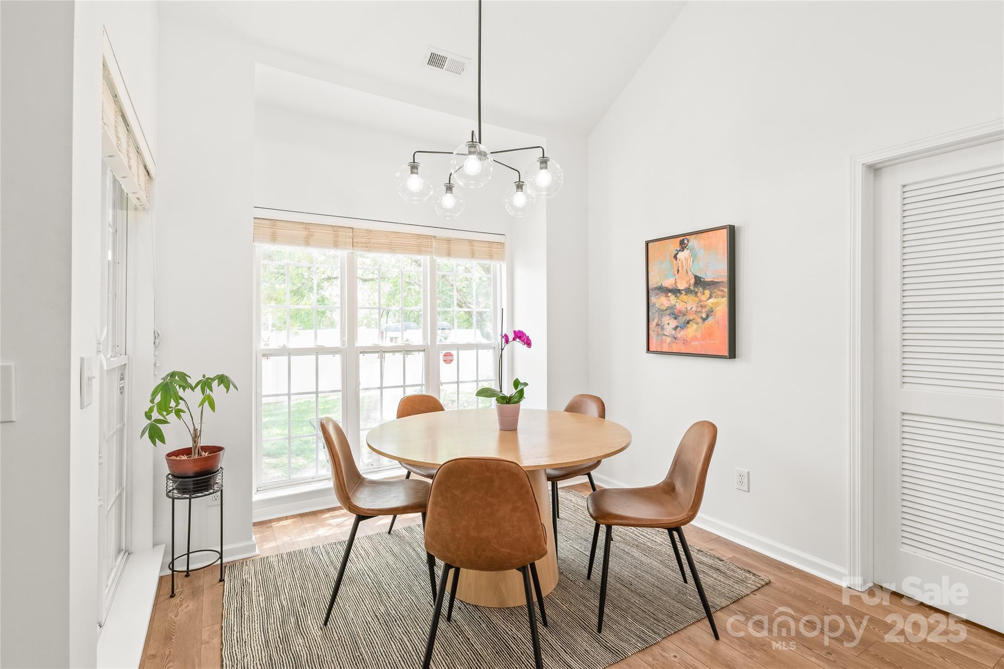 502 Roxanne Court Northwest Concord, NC 28027 - Photo 12 of 40 a view of a dining room with furniture window and outside view