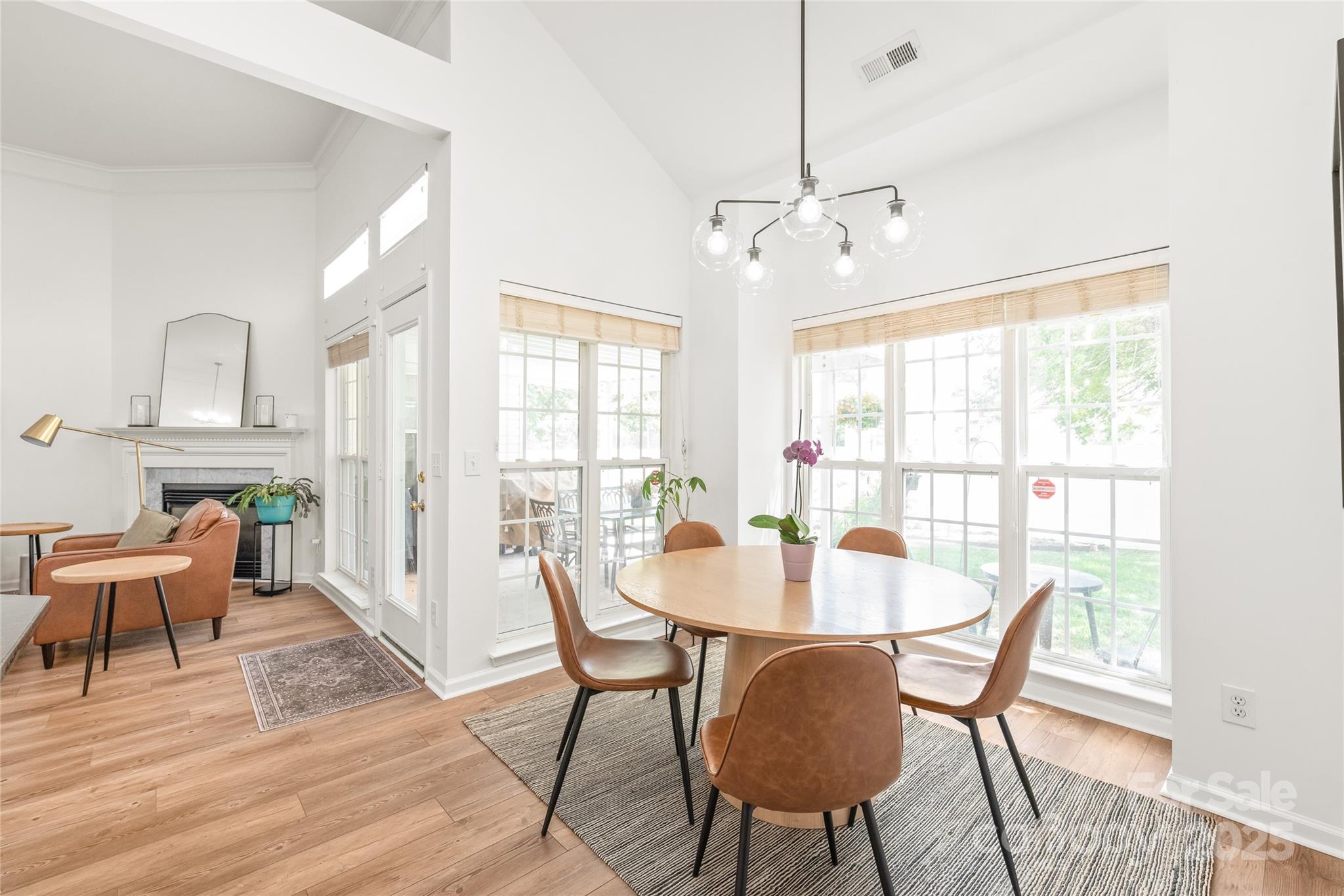 502 Roxanne Court Northwest Concord, NC 28027 - Photo 15 of 40 a view of a dining room with furniture window and wooden floor