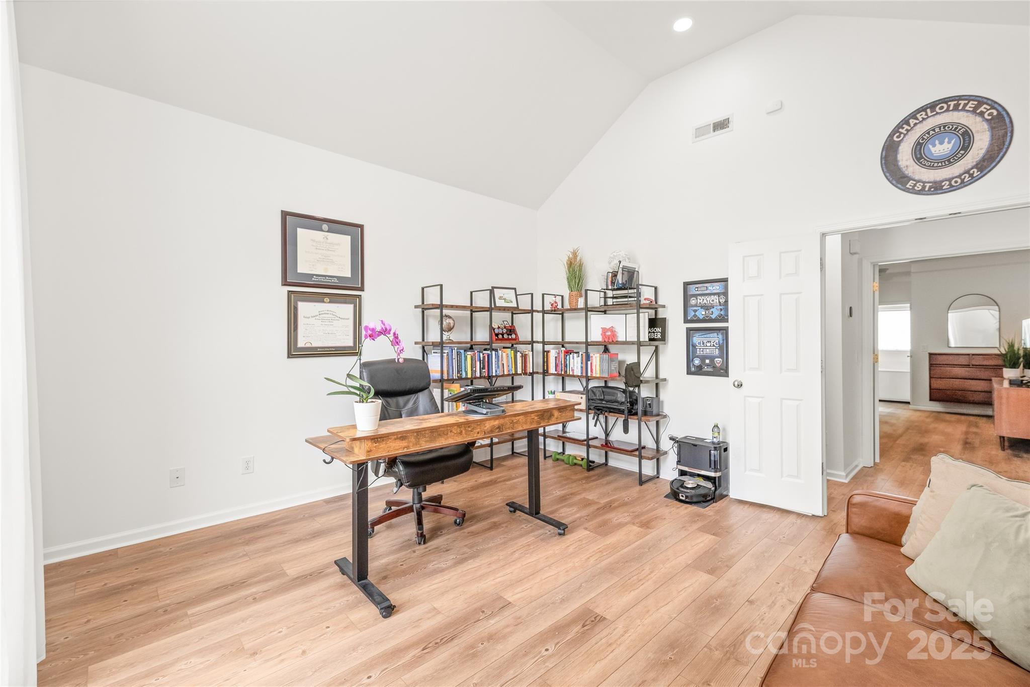 502 Roxanne Court Northwest Concord, NC 28027 - Photo 21 of 40 a workspace with furniture and a wooden floor