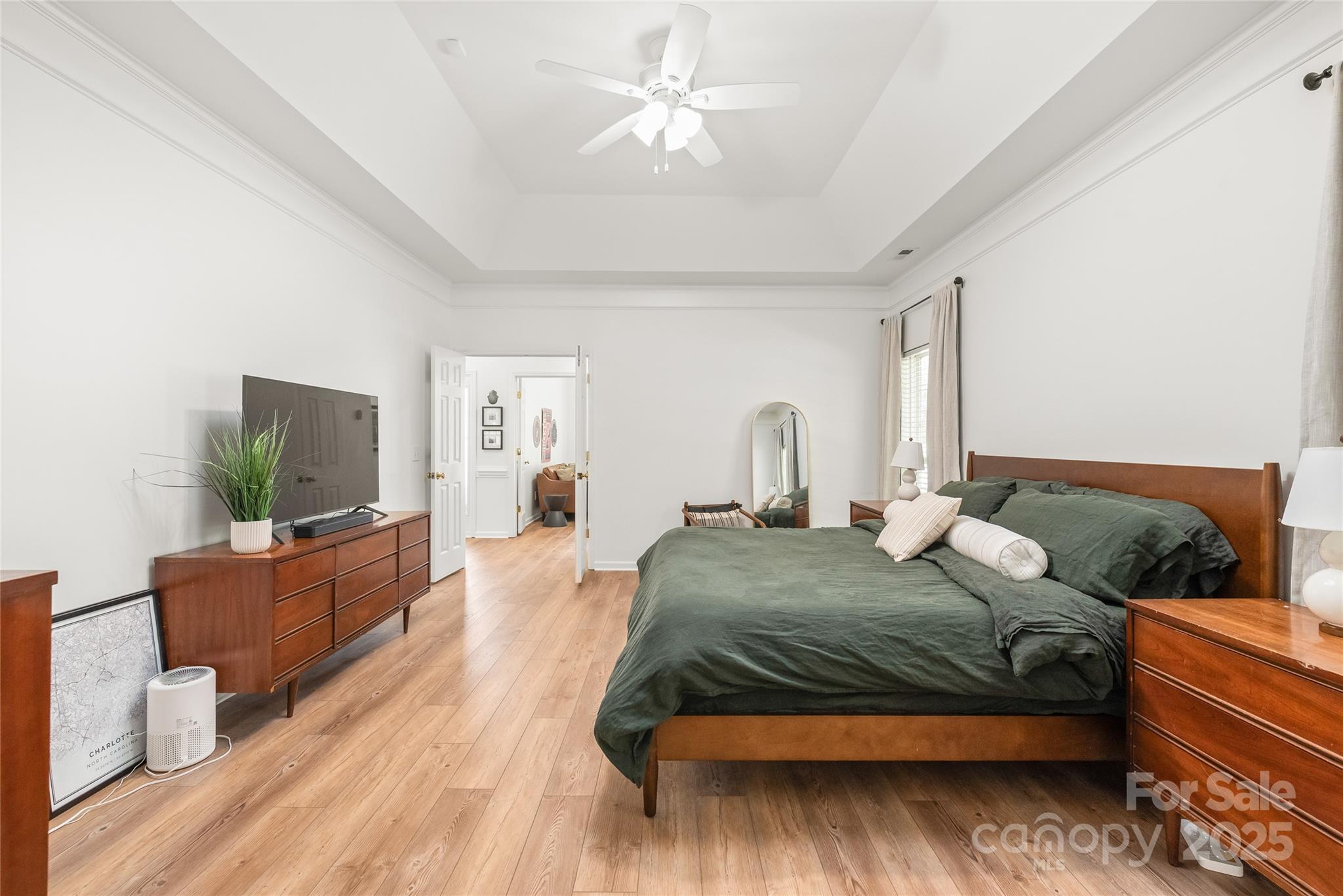 502 Roxanne Court Northwest Concord, NC 28027 - Photo 24 of 40 a bedroom with a bed and a flat screen tv