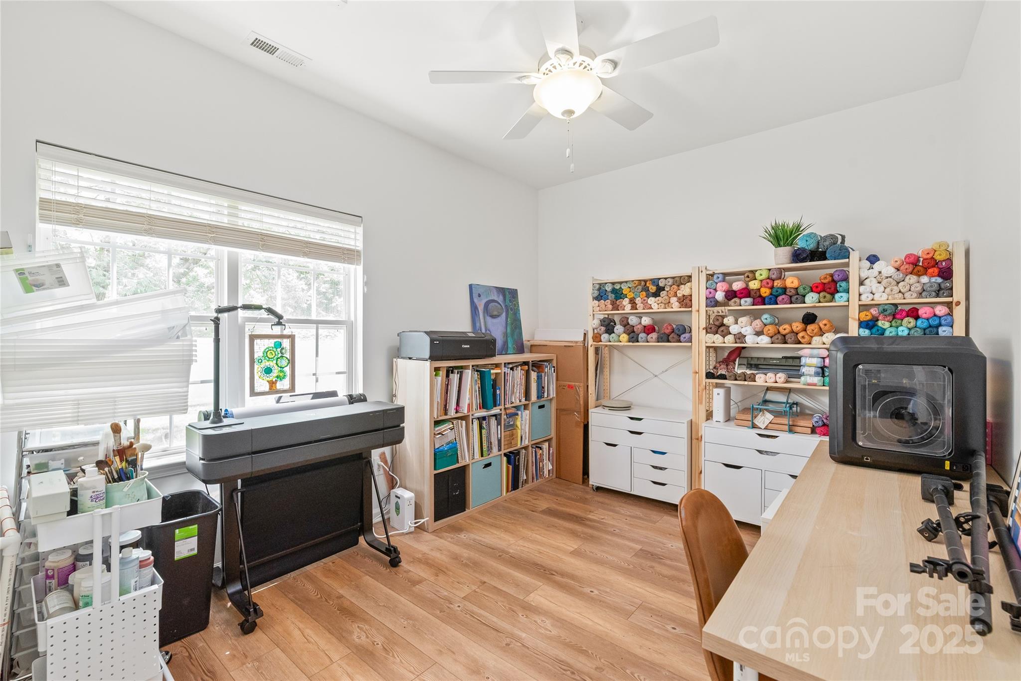 502 Roxanne Court Northwest Concord, NC 28027 - Photo 28 of 40 a view of a workspace with furniture and a window