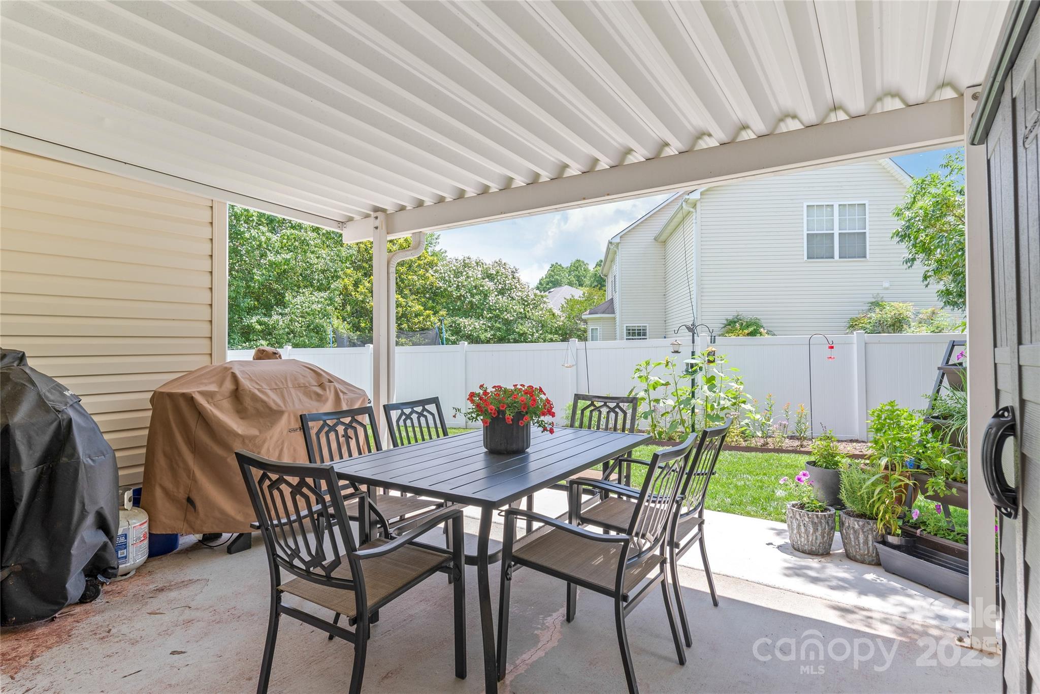 502 Roxanne Court Northwest Concord, NC 28027 - Photo 33 of 40 a view of an outdoor sitting area with furniture and garden view