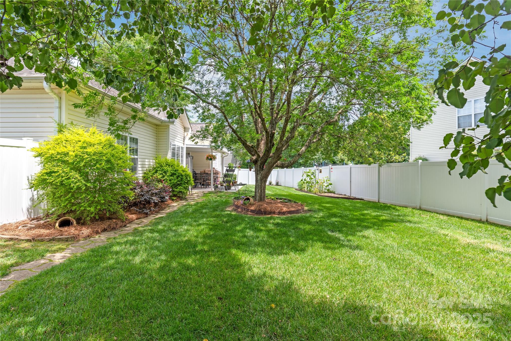 502 Roxanne Court Northwest Concord, NC 28027 - Photo 35 of 40 a view of a garden with a tree
